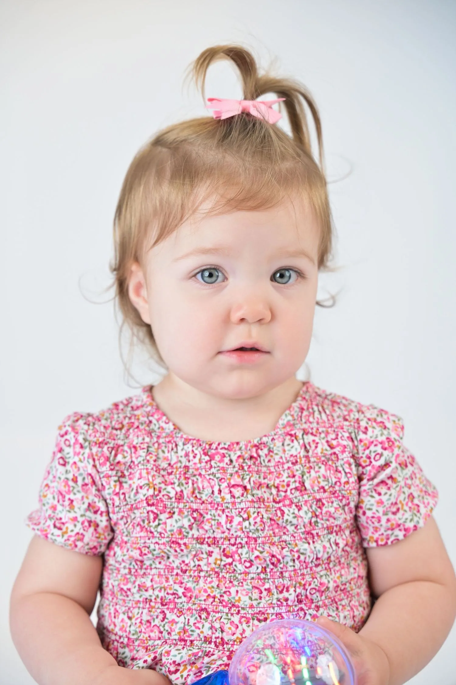 Patiently photographed infant or toddler portrait 7