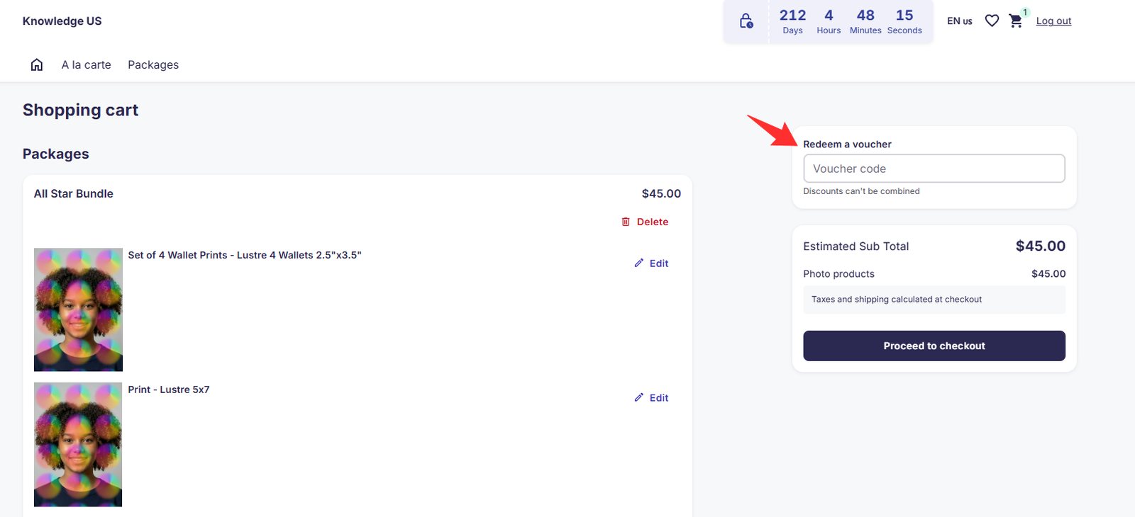 GotPhoto desktop shopping cart showing the Redeem a voucher box with a Voucher code field.