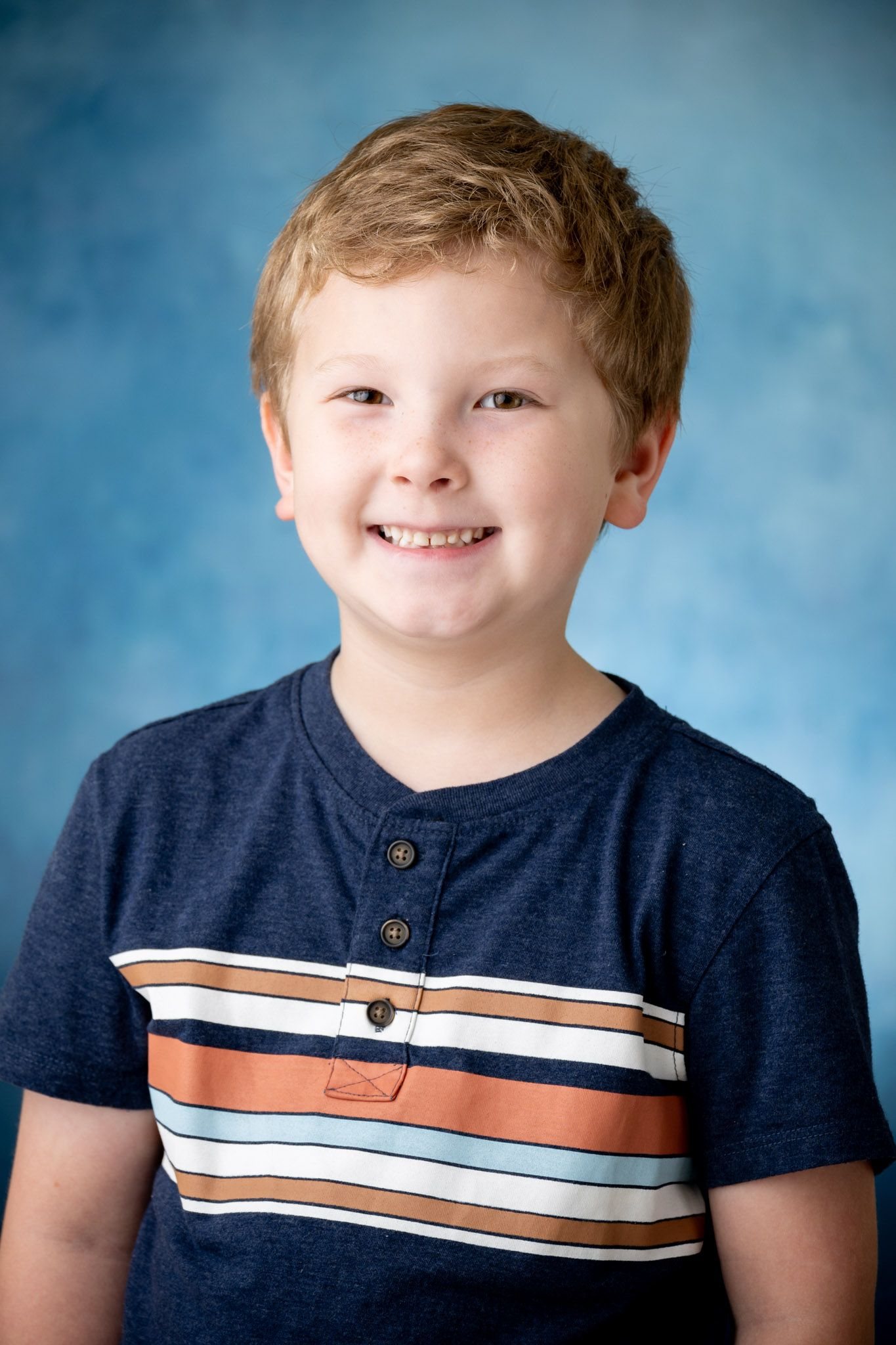 Student prepared for a polished school picture day portrait.
