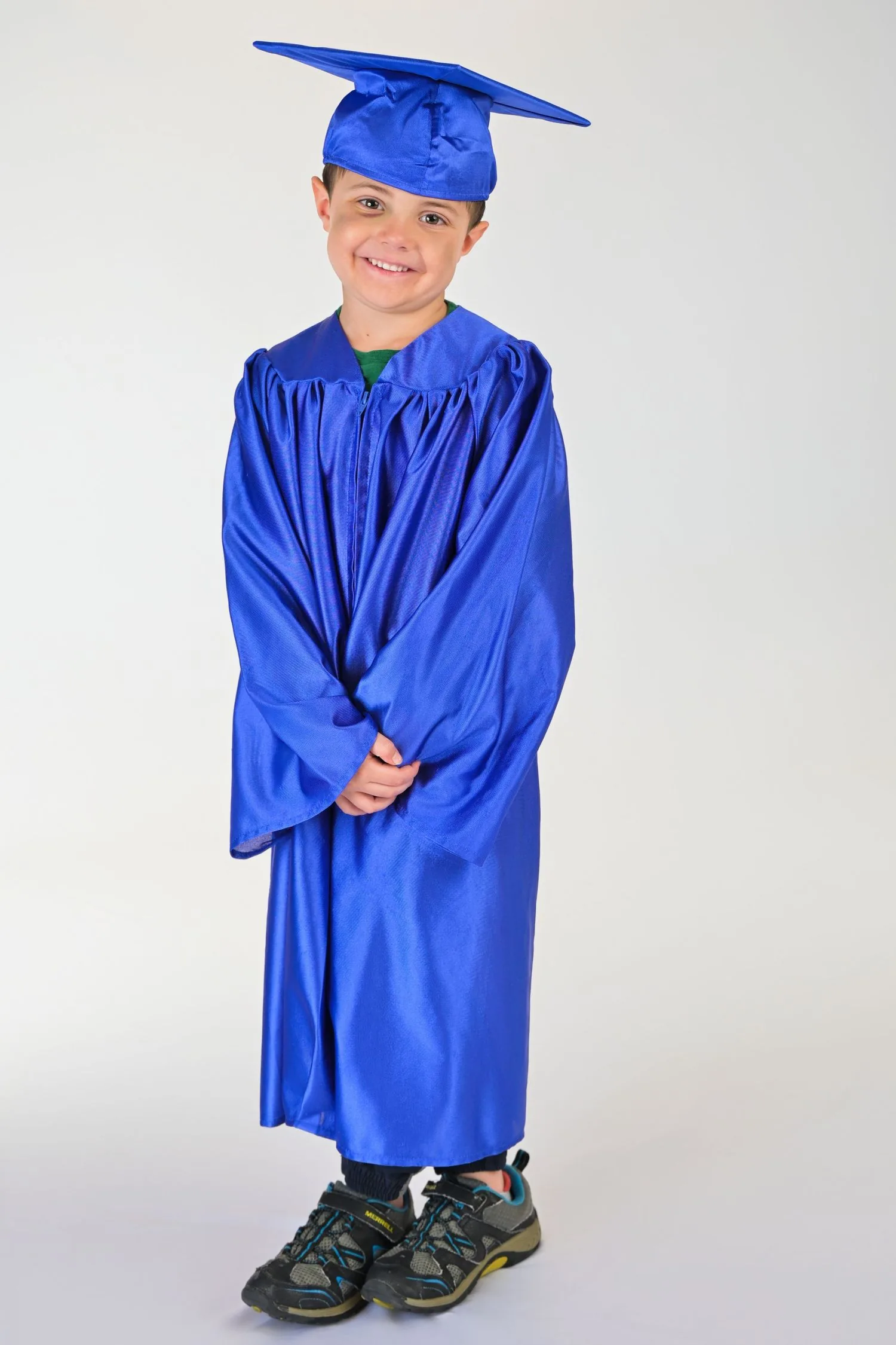 Pre-K graduate in cap and gown portrait 8